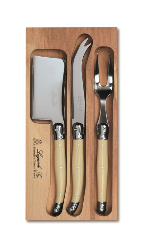 Elegant 3-piece cheese set with ivory handles, crafted in France for functional and stylish cheese serving.