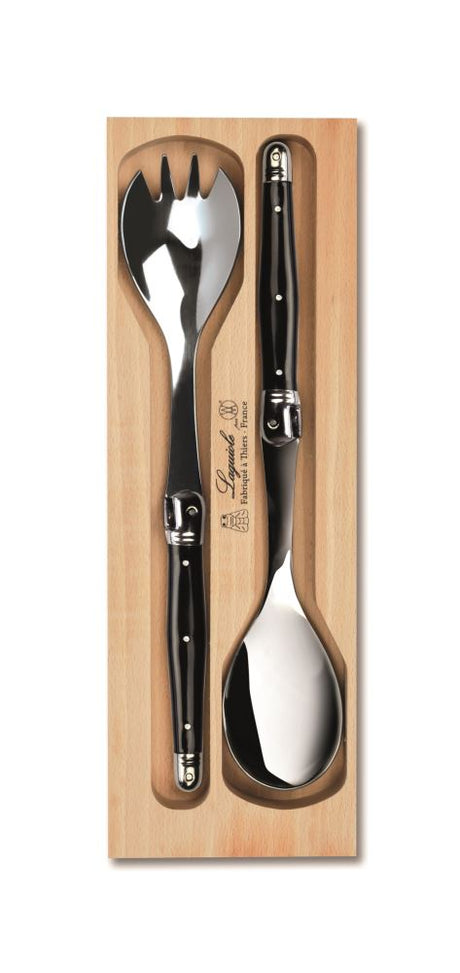 Elegant black resin-handled salad server set with stainless steel tines, handcrafted in Laguiole, France.