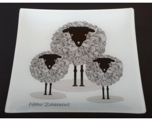 Ornamental glass plate featuring an adorable sheep design, perfect for home decor or as a unique Kiwiana gift.