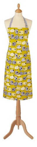 Whimsical Ulster Weavers cotton apron featuring playful dotty sheep design, perfect for cooking and protecting clothes.