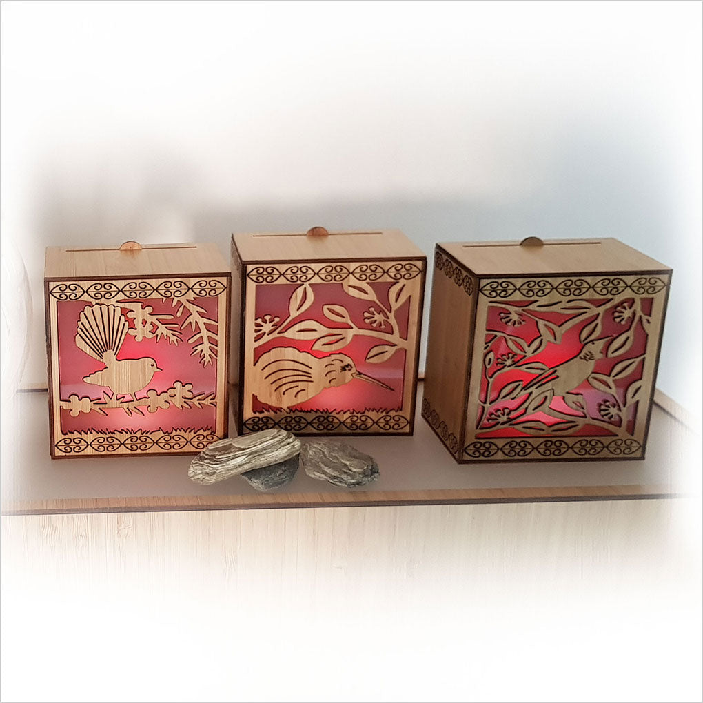 Koru LED Tealight Candle Box in bamboo veneer with color-changing tealight, ideal for ambiance and decor.