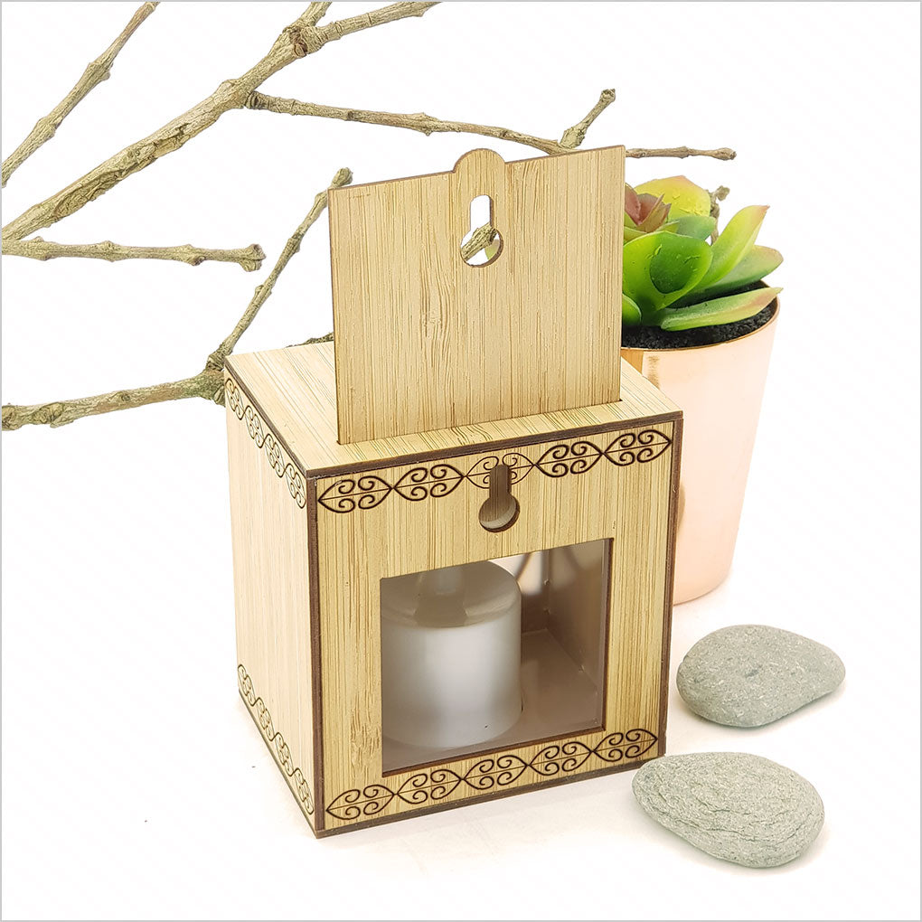 Koru LED Tealight Candle Box made of bamboo, featuring 7 color-changing LED tealights and a wall mount option.