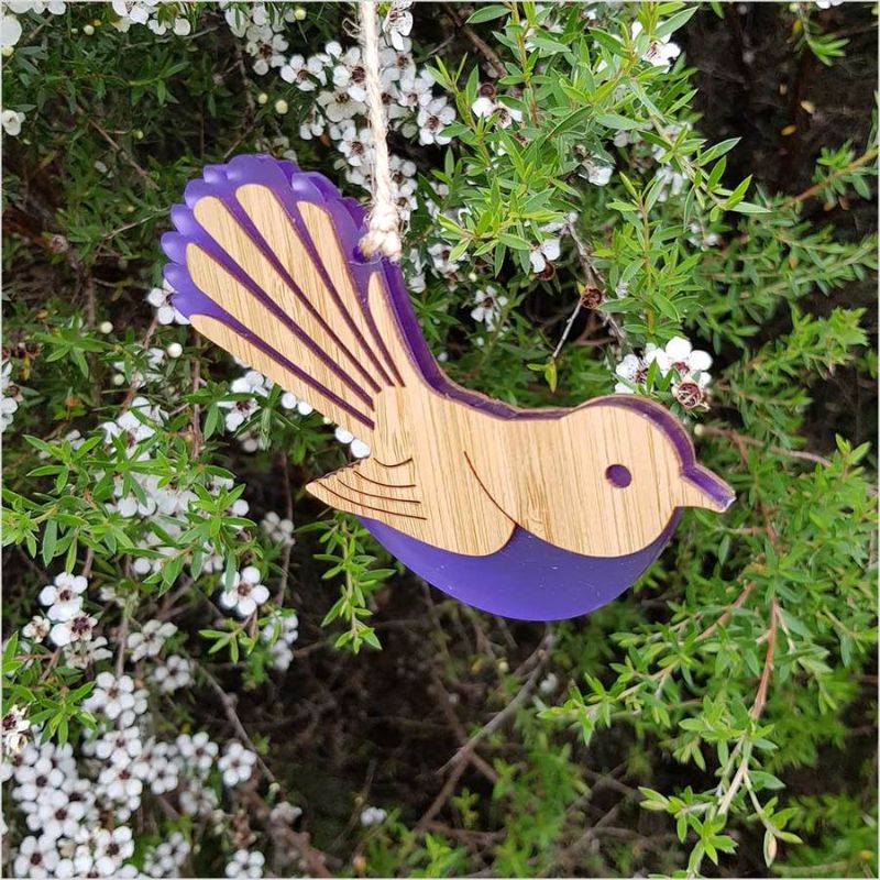 Vibrant purple satin and bamboo hanging ornament in Fantail design, symbolizing joy and freedom, 126mm x 90mm.