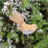 Elegant bamboo and white satin acrylic fantail ornament, intricately laser-cut and ready to hang, perfect for decor or gifting.