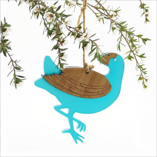 Teal satin acrylic and bamboo ornament shaped like a Pukeko bird, perfect for home decor and gifting.