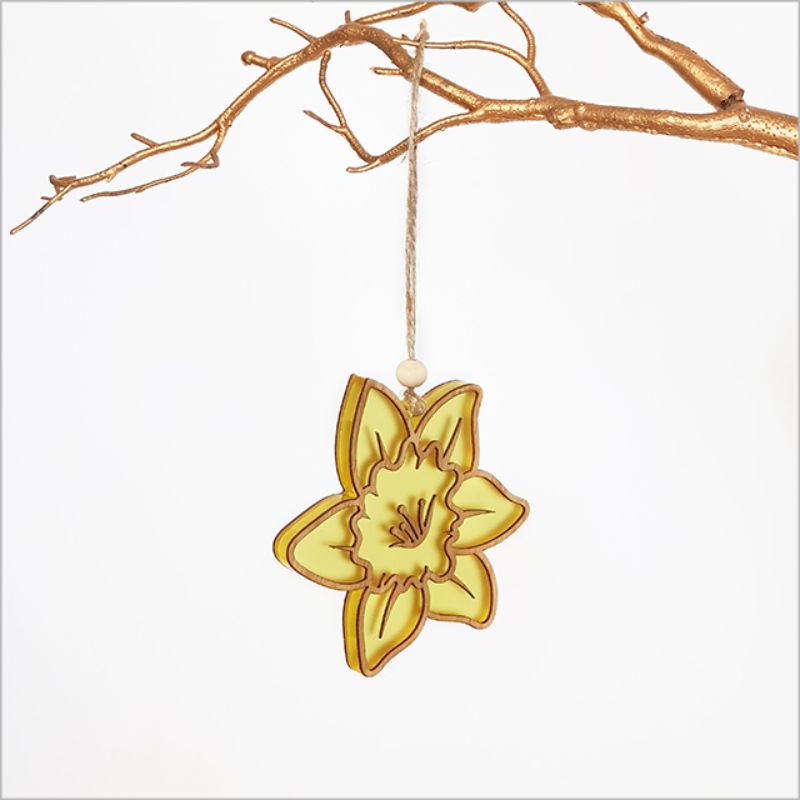 Hanging Daffodil Flower ornament made of bamboo and yellow satin acrylic, perfect for eco-friendly home decor.