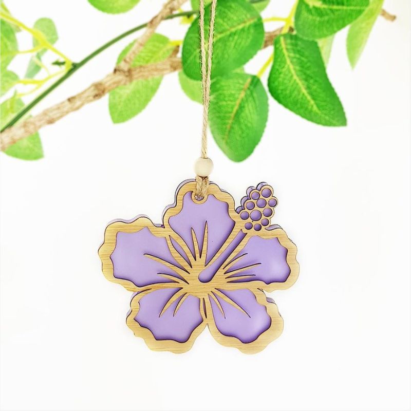 Purple satin acrylic hanging ornament shaped like a hibiscus flower, featuring intricate laser cut details.