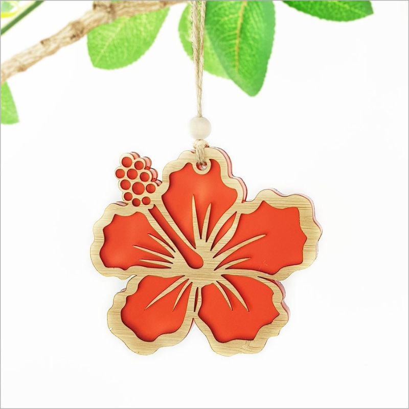 Red satin acrylic hibiscus ornament with intricate laser-cut design, perfect for festive decorating or gifting.