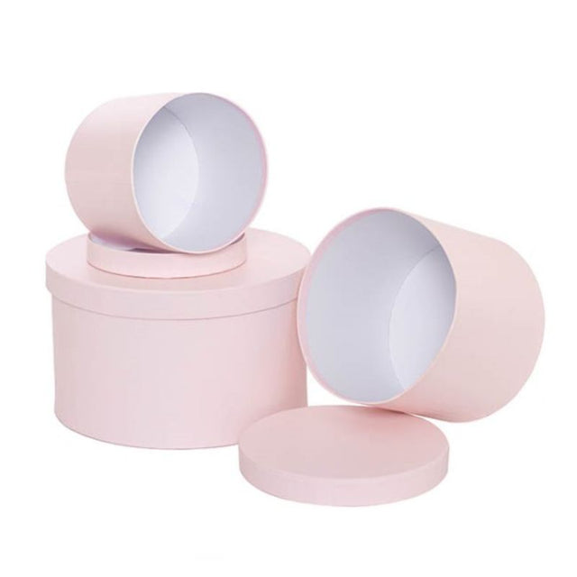 Set of 3 round baby pink gift boxes in varying sizes, perfect for birthdays and baby showers, eco-friendly and reusable.