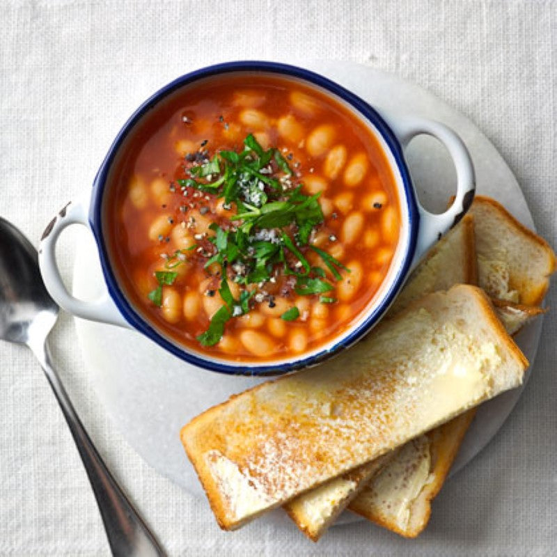 2.95KG tin of Smart Choice Baked Beans in rich tomato sauce, nutritious and perfect for family meals.