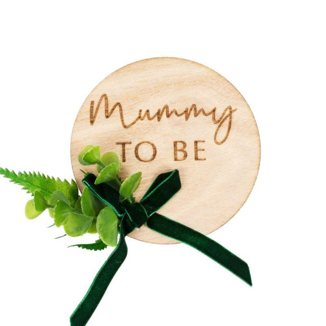 Wooden badge for expectant mothers, measuring 13cm W x 10cm H, perfect for baby shower celebrations.