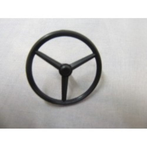 Billing Boats fittings featuring a detailed wheel, designed for enhancing model boat precision and aesthetics.