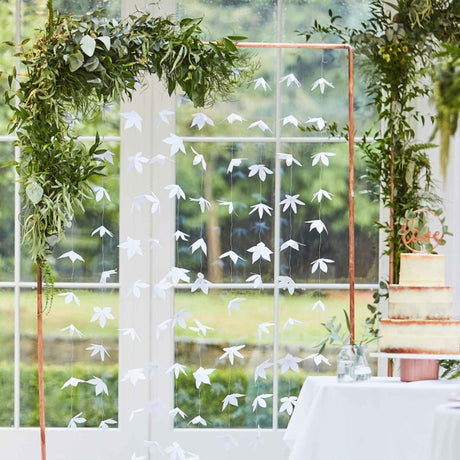 Elegant white origami flowers backdrop, 1.8m long, perfect for romantic wedding photo settings.