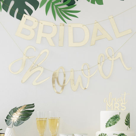 Gold 'Bridal Shower' bunting by Ginger Ray, 2m long, made of foiled cardboard, perfect for classy hen party decor.