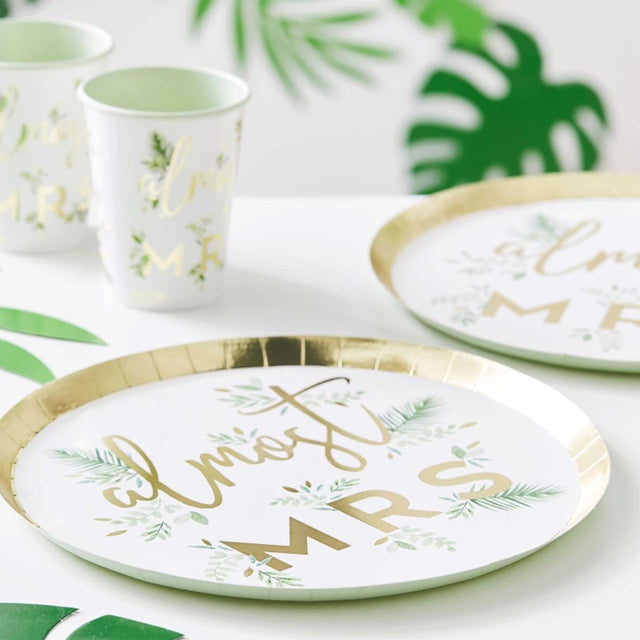 Gold foiled 'Almost Mrs' plates in a floral design, perfect for elegant hen party celebrations, pack of 8, 25cm diameter.