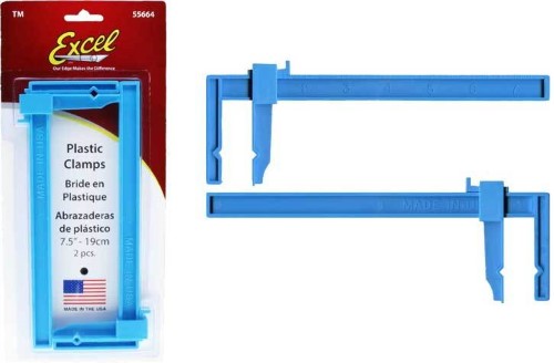 Large 7.5-inch plastic clamps for precise grip and stability in woodworking and crafting projects.