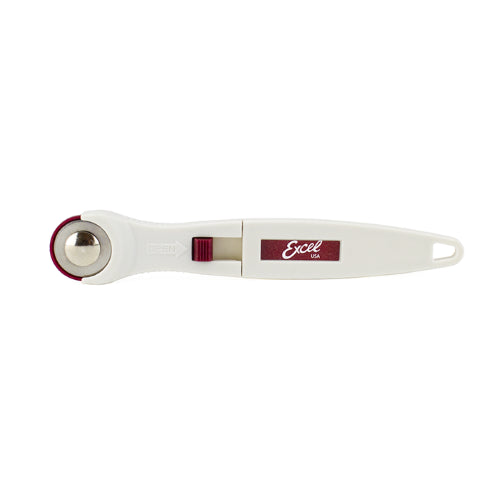 Small 20mm rotary cutter with ergonomic handle and safety lock, ideal for precise cutting in crafting projects.