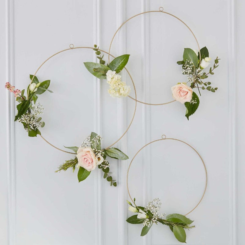 Set of 3 gold floral hoops (12", 14", 16") for elegant wedding decor, perfect for flowers and stunning arrangements.
