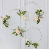 Set of 3 gold floral hoops (12", 14", 16") for elegant wedding decor, perfect for flowers and stunning arrangements.