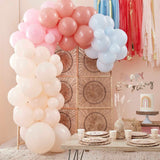 Pastel balloon arch backdrop in peach, pink, and blue hues; perfect for festive celebrations and easy to assemble.