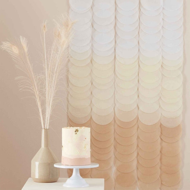 Neutral ombre tissue paper disc backdrop, 1.8m tall, featuring 18 cascading discs for elegant party decor.