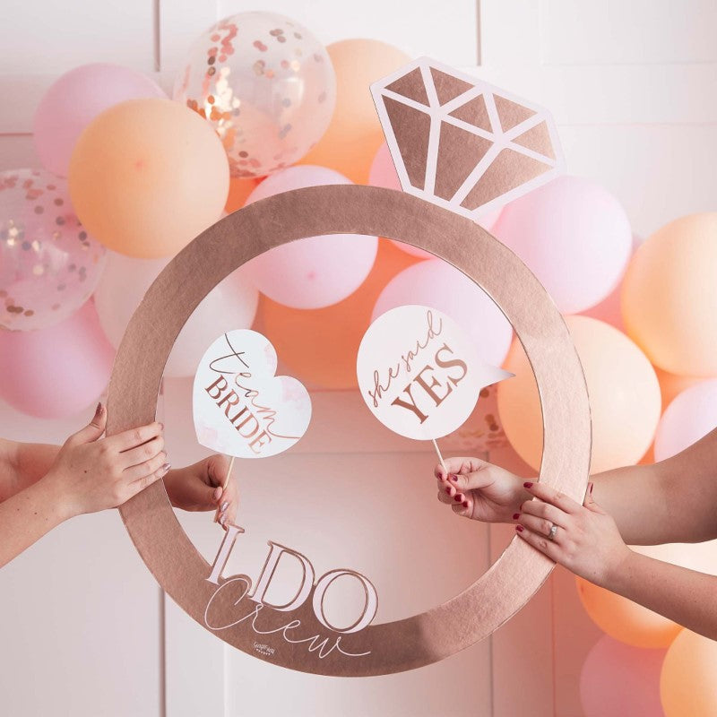 Rose gold ring photo booth frame for hen parties, 59cm W x 74cm H, perfect for fun and memorable Bachelorette moments.