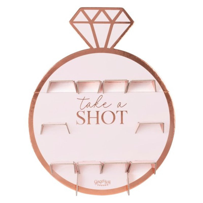 Rose gold drinks shot wall for hen parties, featuring 10 holders and a stylish cardboard design.