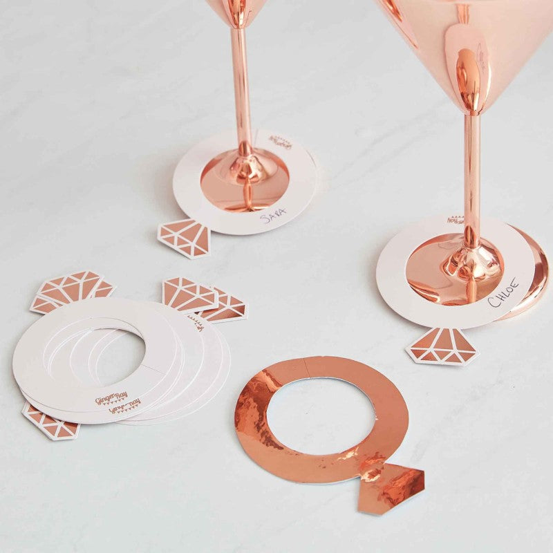 Rose gold ring-shaped drink markers, pack of 10, ideal for personalizing drinks at weddings and special occasions.