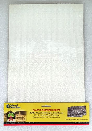 Two sheets of JTT plastic patterned wood roof shingles for hobby model scenery.