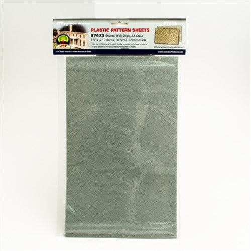 Two plastic stucco wall sheets for model railways, enhancing detail and texture in N scale dioramas.