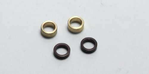Kyosho ZX5/RB5 Axle Hub in gunmetal finish, enhancing RC performance with precision and durability.