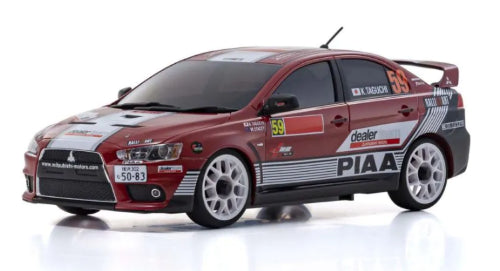 Kyosho MA-020 Lancer Evo X model with AWD, featuring adjustable gyro, VCS suspension, and 2.4GHz transmitter for superior drifting.