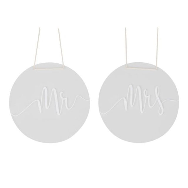Elegant acrylic 'Mr' and 'Mrs' chair signs adorned with white script and macrame rope, perfect for wedding decor
