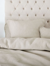 Elegant oatmeal coverlet set by Savona for King/Super King beds, featuring a quilted leaf texture and premium cotton.