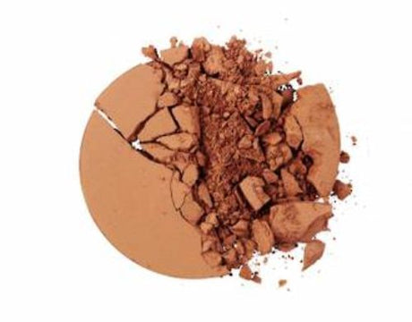 LA Girl Pro Face Powder in Warm Caramel for a radiant, matte finish; ideal for medium to deep skin tones.