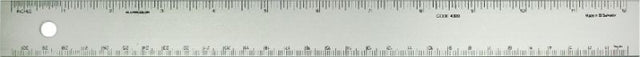 Deluxe conversion ruler made of aluminum, featuring 1/16 inch and millimeter scales for precise measurements in crafting.