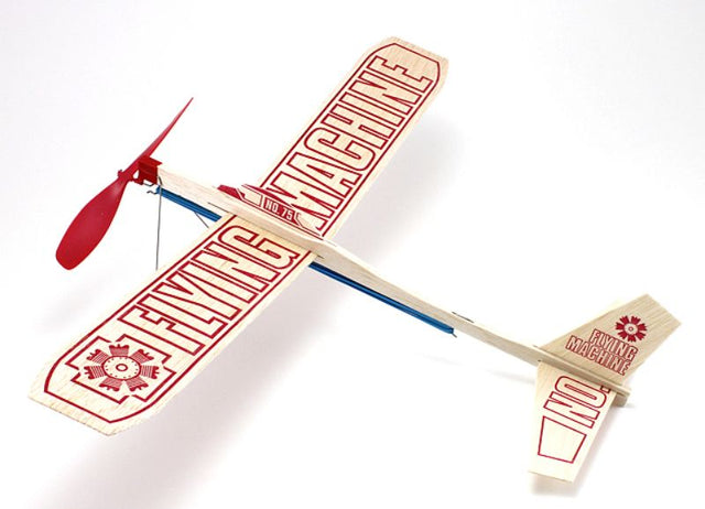 Balsa wood flying machine kit for DIY glider building; rubber-powered, educational, and perfect for indoor/outdoor play.