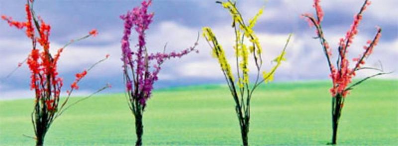 Vibrant JJT Model Scenery flower bushes in assorted sizes, perfect for enhancing O scale dioramas and miniature landscapes.