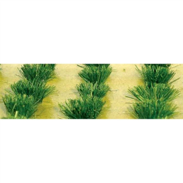 Set of 30 realistic detachable grass bushes for enhancing model railways and dioramas with vibrant greenery.