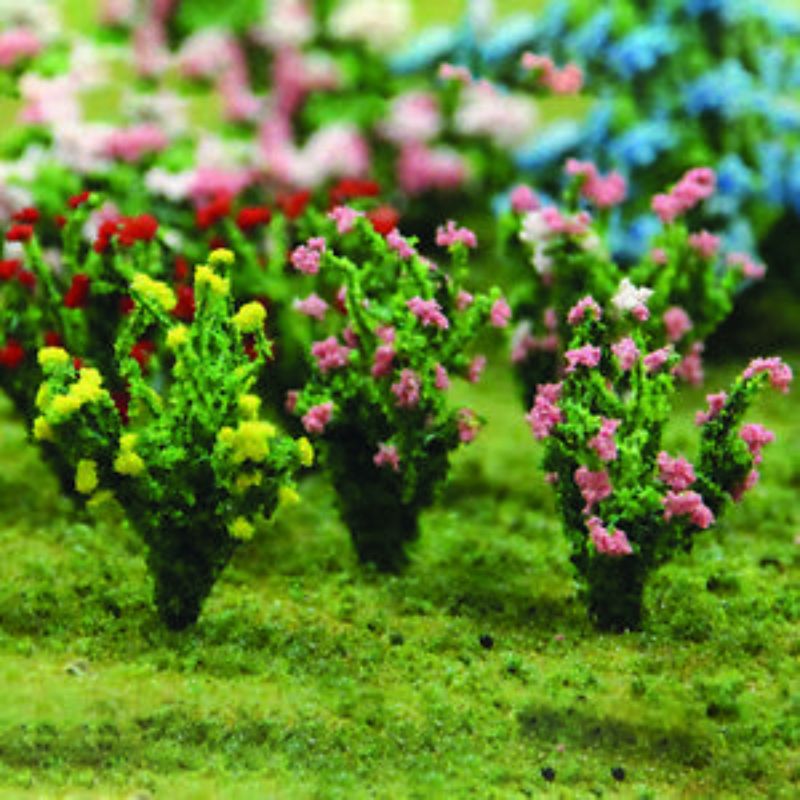 Detailed HO scale hibiscus model plant for realistic scenery in train layouts and dioramas.