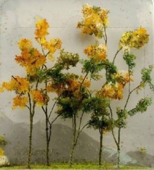 Five highly detailed autumn trees for O scale model railways and dioramas, enhancing realism and visual appeal.