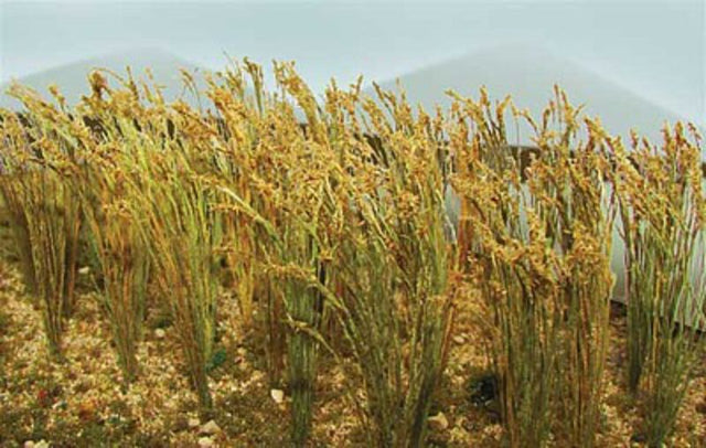 Realistic HO scale model wheat stalks, ideal for enhancing railway scenery and dioramas with vibrant detail.