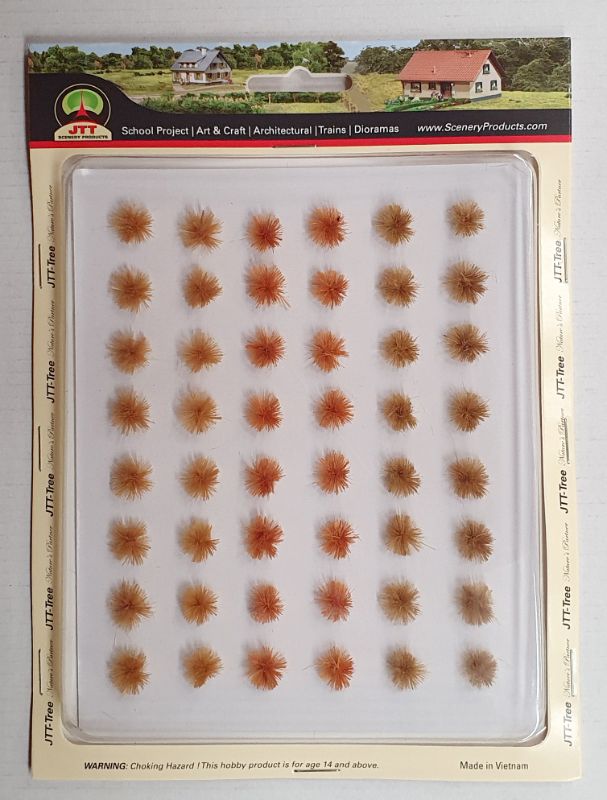 Realistic wild grass tufts set for model landscapes, 48 clumps in diverse colors and textures for dioramas and railway layouts.