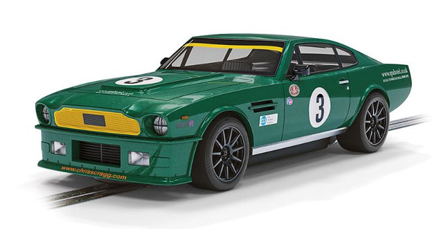 Scalextric Aston Martin V8 #3 in classic green and yellow, featuring sidewinder chassis and detailed interior for racing.
