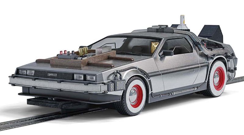 Scalextric Movie DeLorean from 'Back to the Future Part III' with Wild West design and white-walled tires, perfect for racing.