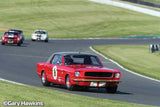 Scalextric Goodwood Mustang #8 slot car in red and gold, celebrating motorsport heritage and delivering high-speed racing excitement.