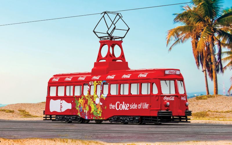 1/76 scale Corgi diecast tram featuring iconic Coca-Cola 'Side of Life' branding, perfect for collectors and enthusiasts.