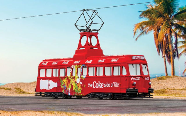 1/76 scale Corgi diecast tram featuring iconic Coca-Cola 'Side of Life' branding, perfect for collectors and enthusiasts.