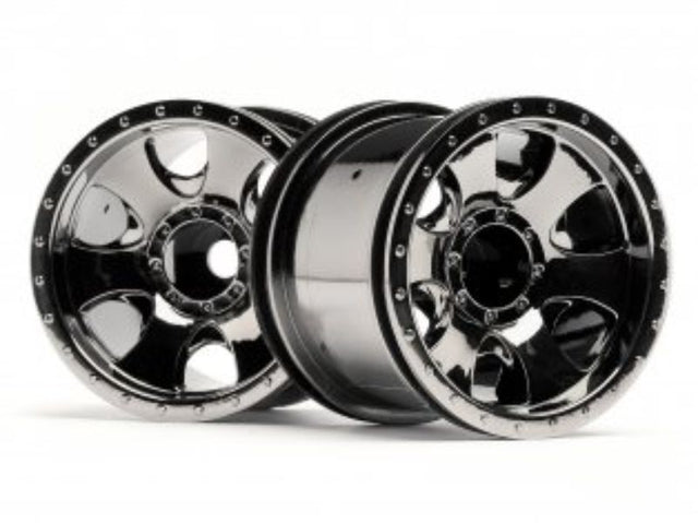 1/10 scale black chrome Warlock wheels enhancing RC car performance and style with superior traction and stability.