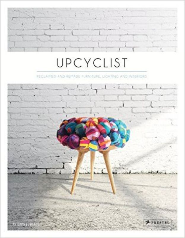 Hardback book on upcycling showcasing innovative designs from reclaimed materials, featuring furniture, lighting, and art objects.